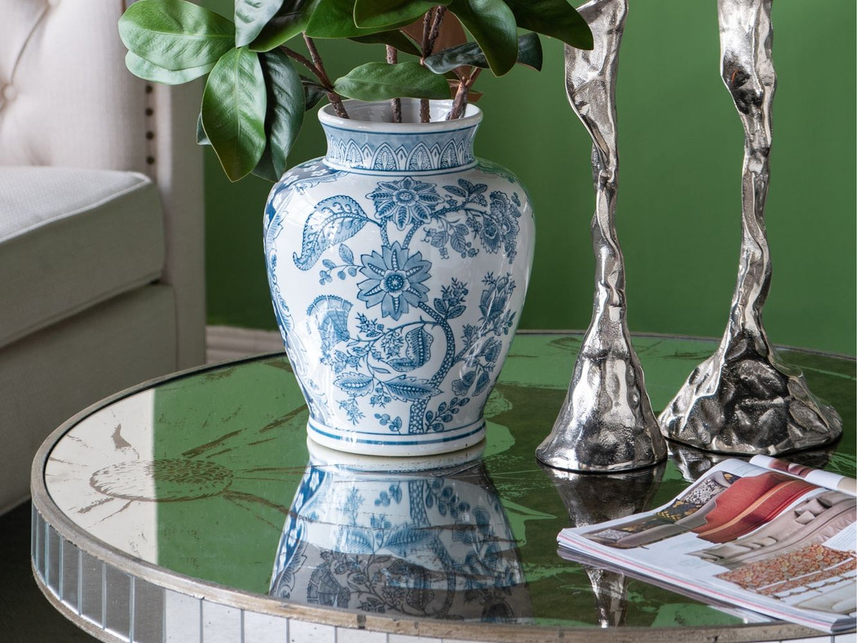 Round Table With Elegant Foral Design And Mirrored